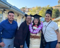 Group of people celebrating a woman's graduation